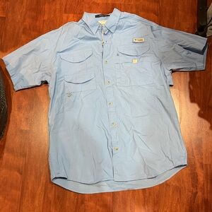 blue size medium columbia button down fishing shirt